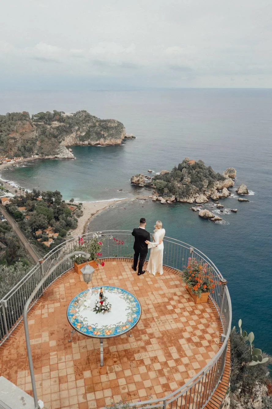 A clifftop terrace above the sea at Taormina — already designed elopement, Sicily
